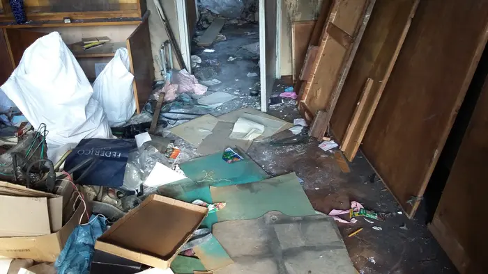 Изхвърляне на изгорели предмети след пожар